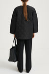 Halima loose flared quilted padded jacket black stylein model image back