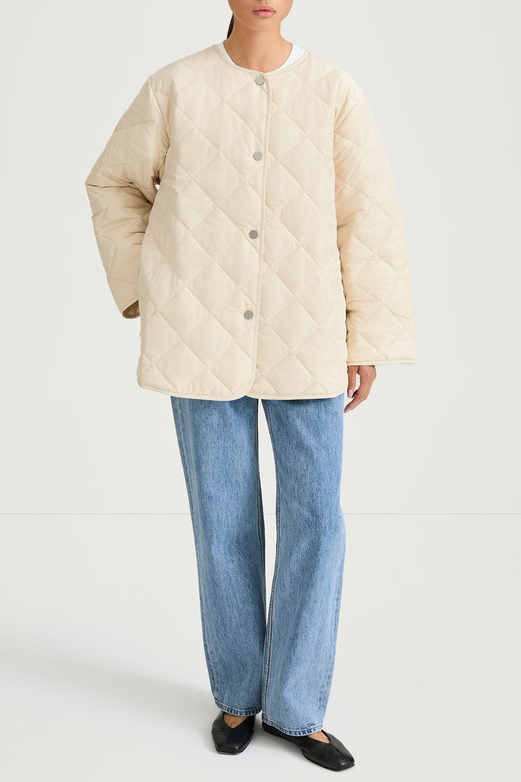 Halima loose flared quilted padded jacket ivory stylein model image front