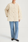 Halima loose flared quilted padded jacket ivory stylein model image front