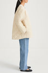 Halima loose flared quilted padded jacket ivory stylein model image side