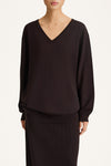 Heramira merino wool v-neck sweater coffee stylein model image front close
