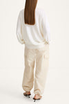 Heramira merino wool v-neck sweater cream stylein model image back