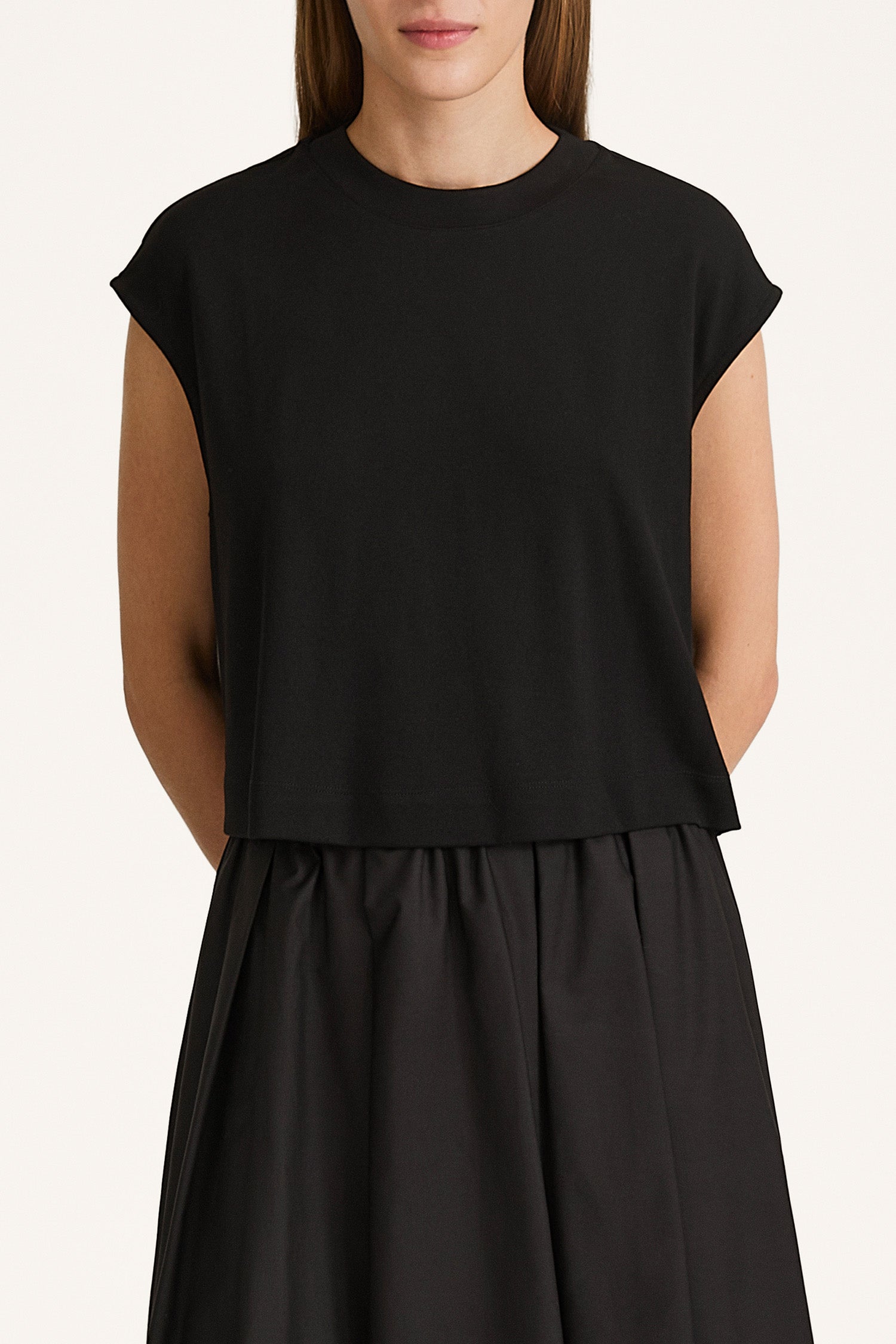 Jenn top black sleeveless cropped cotton top model image front close