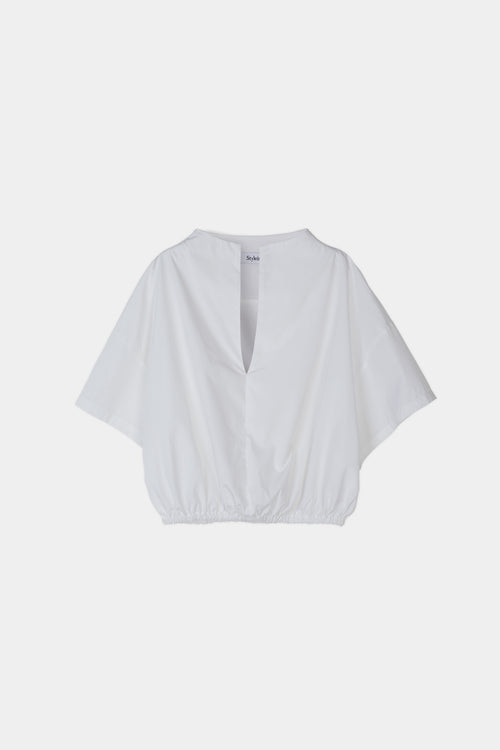 Jilly shirt voluminous vneck subtle high neck short wide sleeves gathered bottom hem white stylein packshot