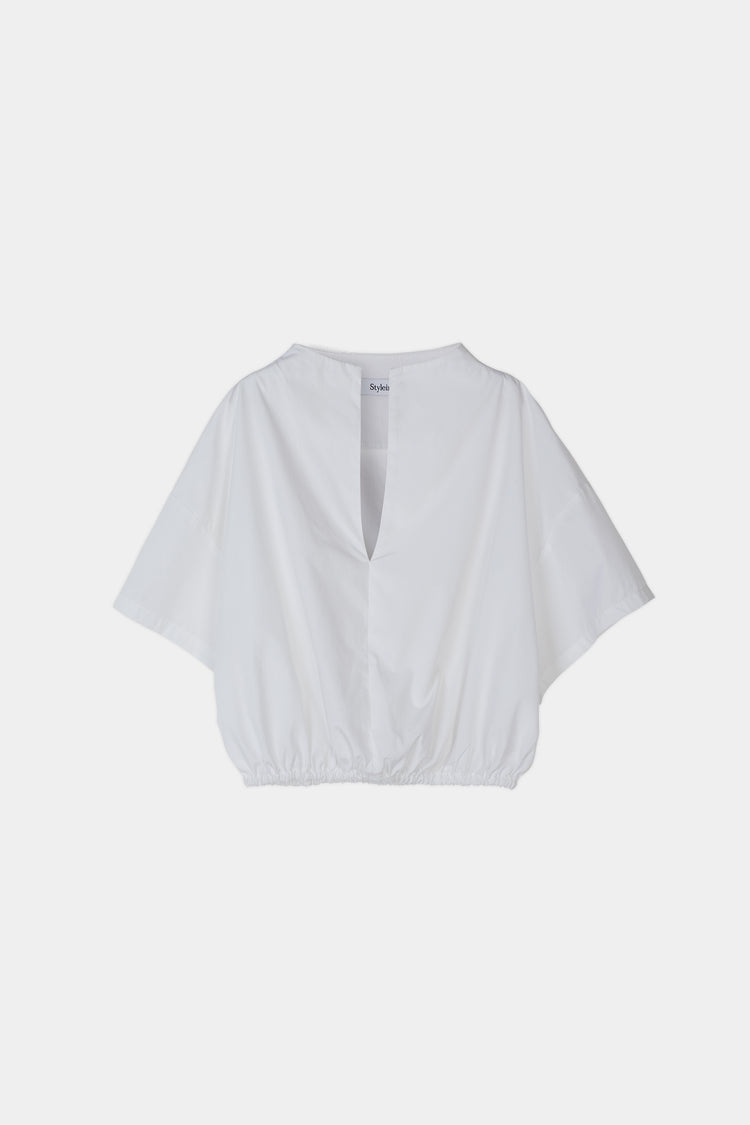 Jilly shirt voluminous vneck subtle high neck short wide sleeves gathered bottom hem white stylein packshot