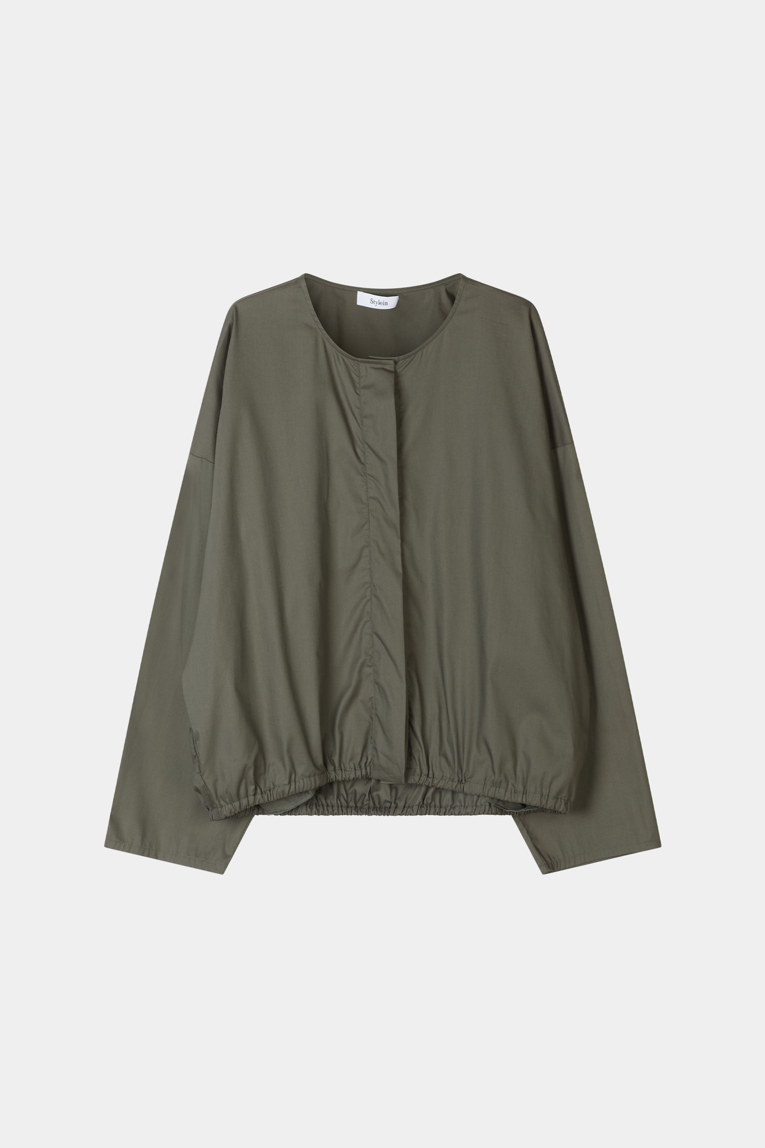 green volumnious shirt stylein jotorio packshot