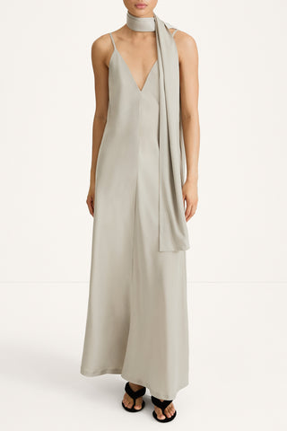 maxi slip dress in sage green with a scarf stylein macena model image