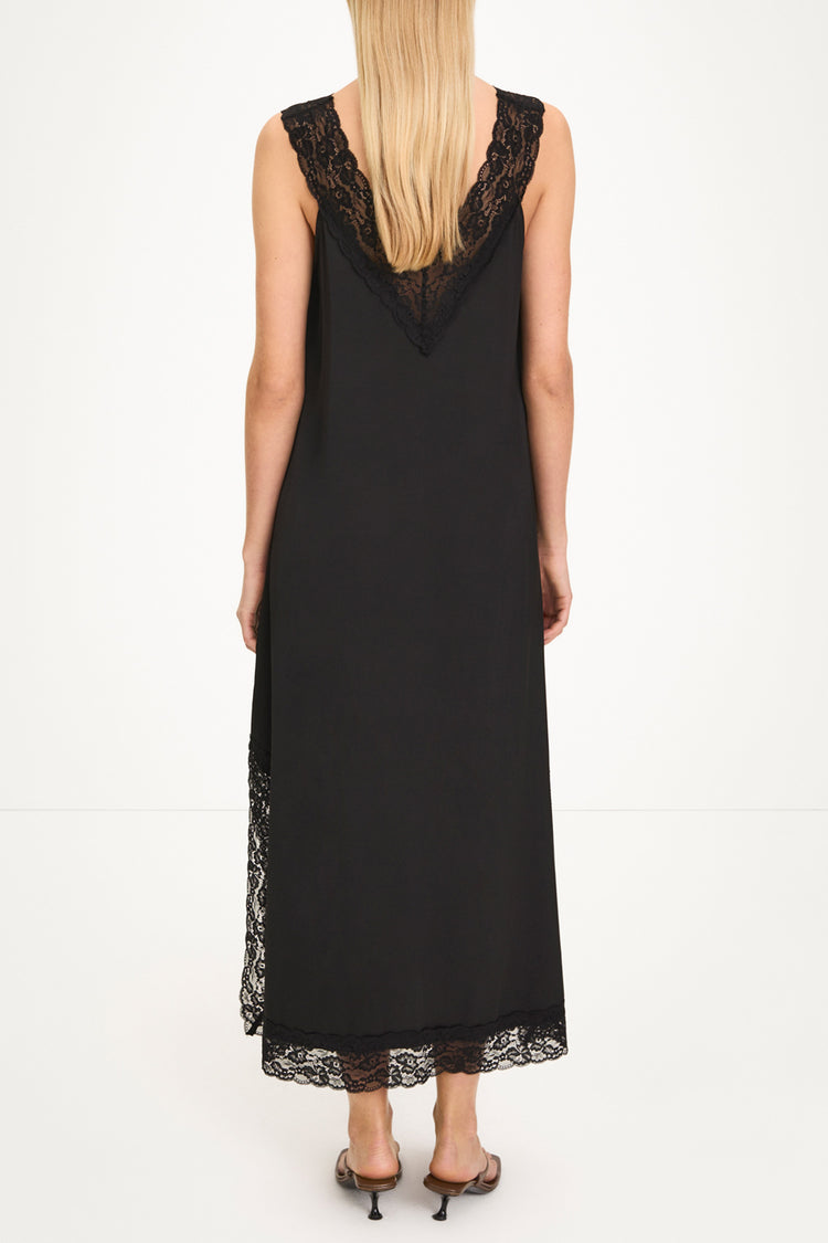Malea black v-neck lace trim dress model image back