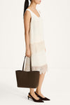 Medonia knee lenght midi skirt lace detail cream stylein model image side