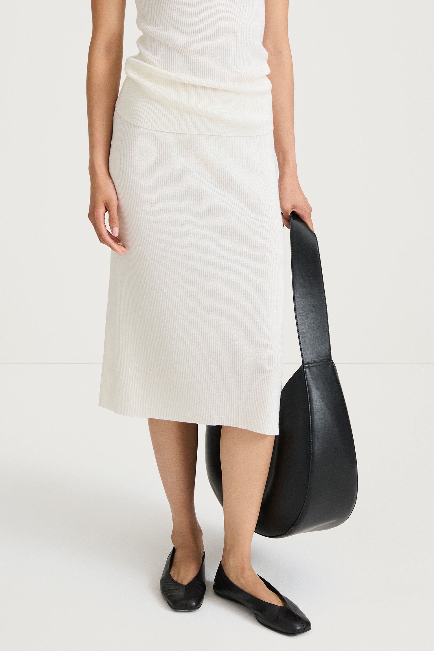 Pearla ribbed knit midi long skirt merino wool cream stylein model image front close