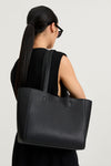 Mini yacht bag black faux leather stylein model image