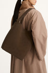 Youness bucket bag faux suede coffee stylein model image side