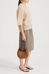 Beige knitted transparent sweater short sleeve stylein nia side model image