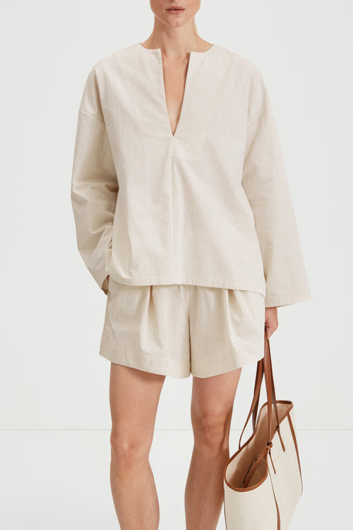 Monte blouse voluminous v neck wide sleeves seersucker beige white stripe stylein front image