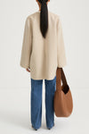 Beige wool coat stylein tara back model image