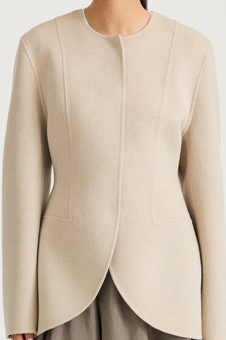 Beige wool jacket cinched waist stylein tyra front close up model image