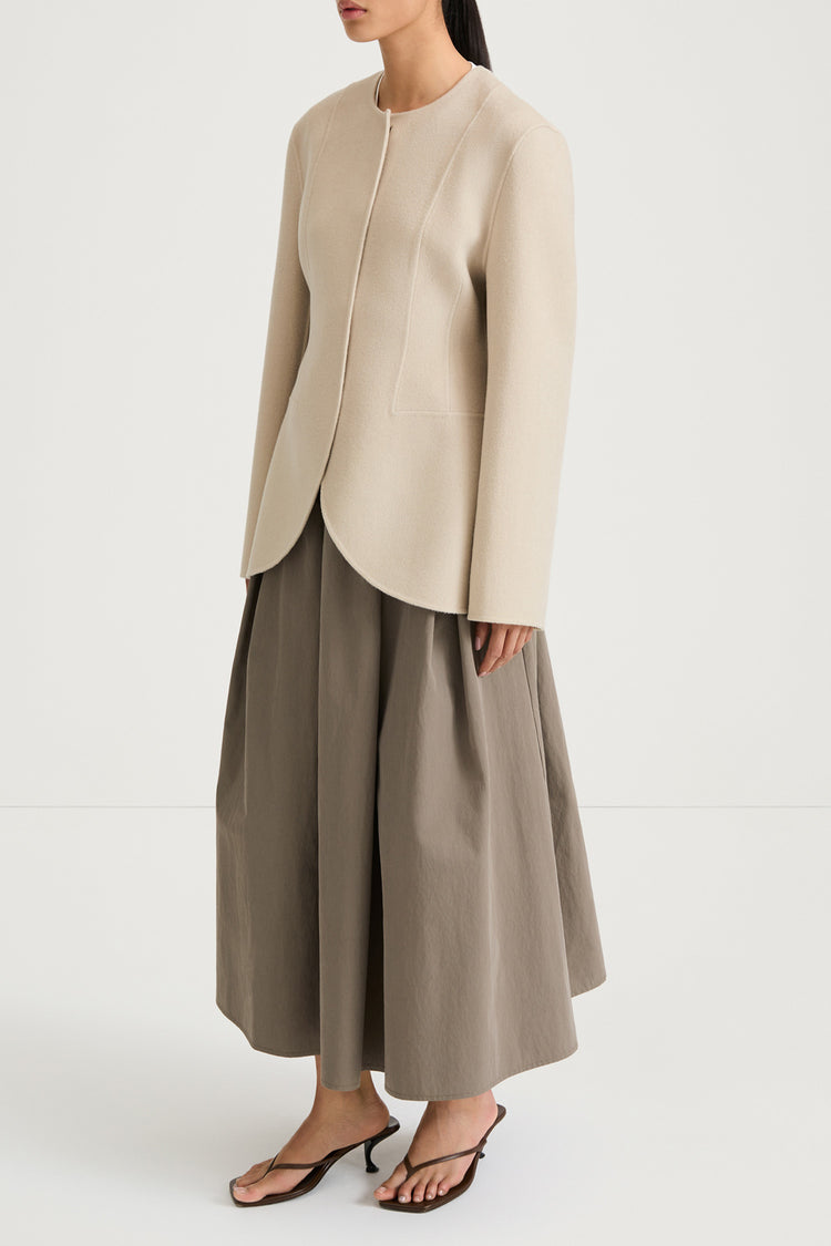 Beige wool jacket cinched waist stylein tyra side model image