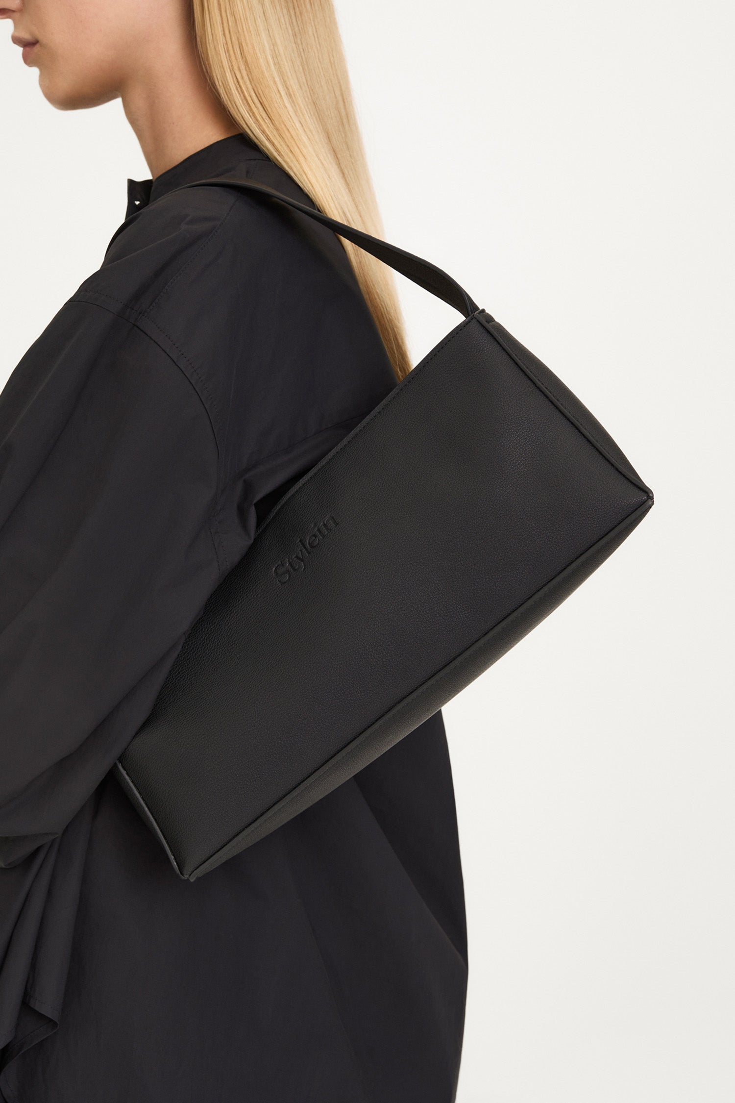 Yosef small baguette bag faux leather black structured stylein packshot side 