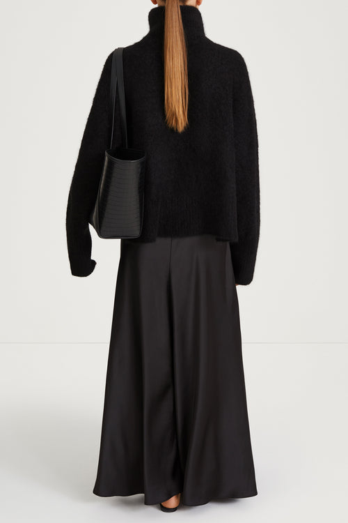 black knitted polo sweater stylein nike back