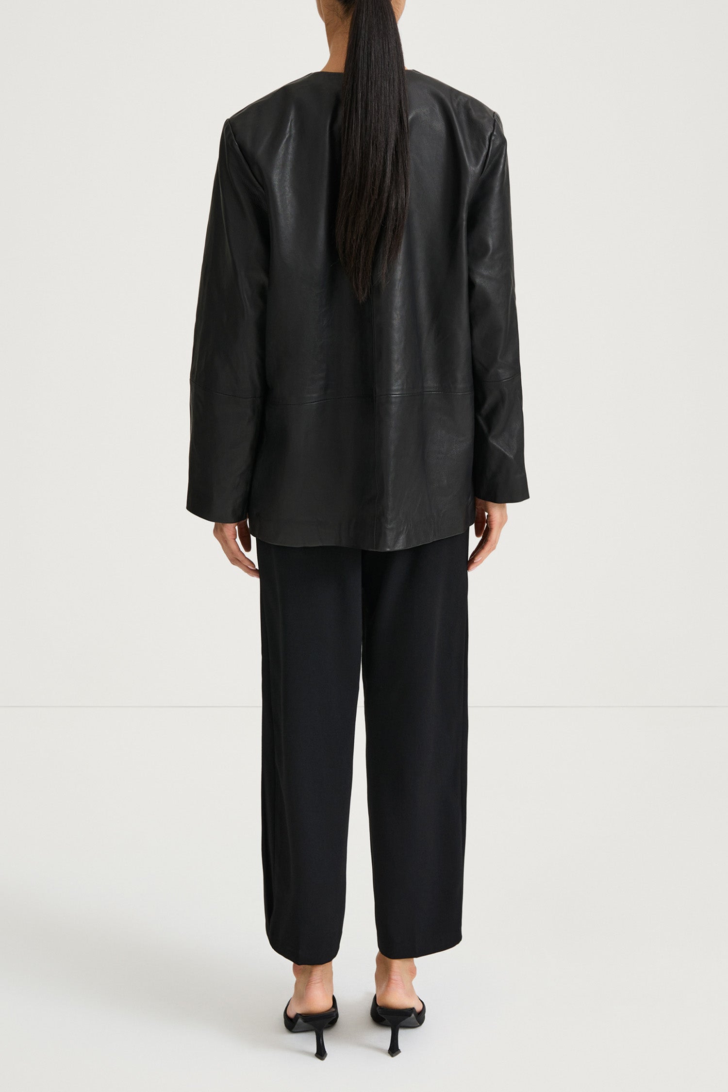 Black leather jacket stylein valencia back model image