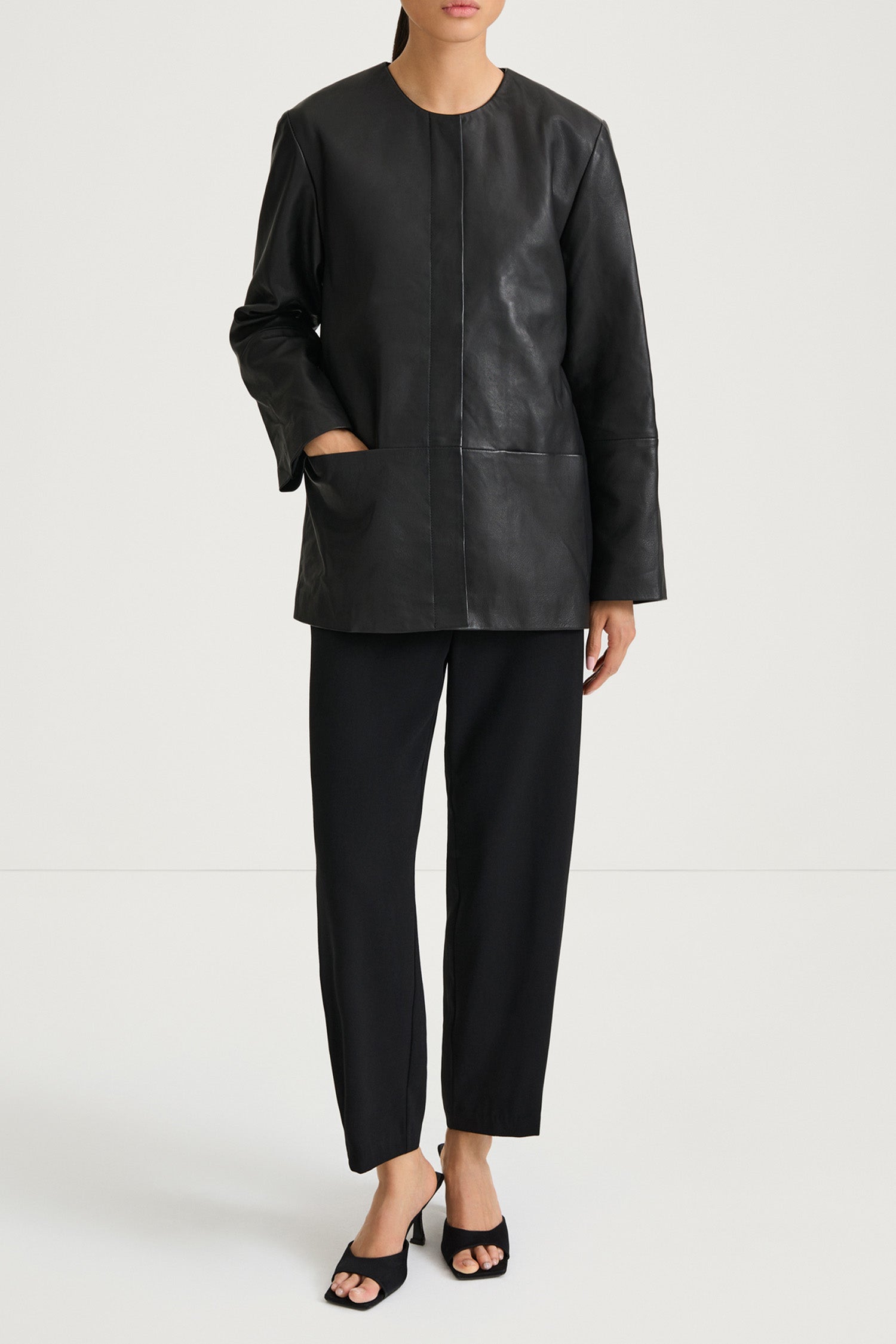 Black leather jacket stylein valencia front model image