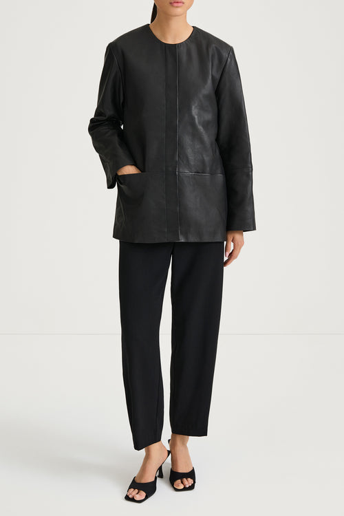 Black leather jacket stylein valencia front model image