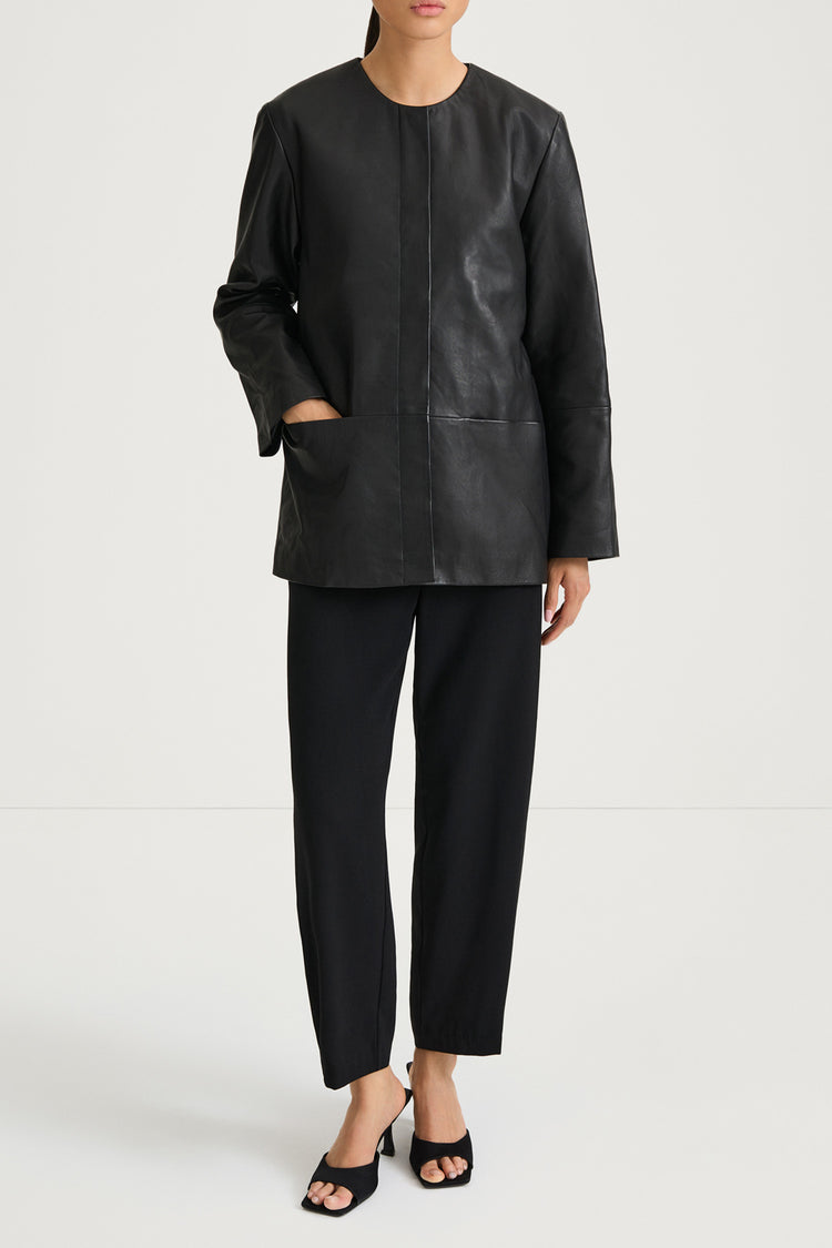 Black leather jacket stylein valencia front model image