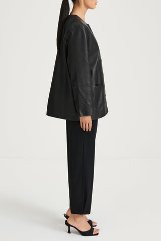 Black leather jacket stylein valencia side model image