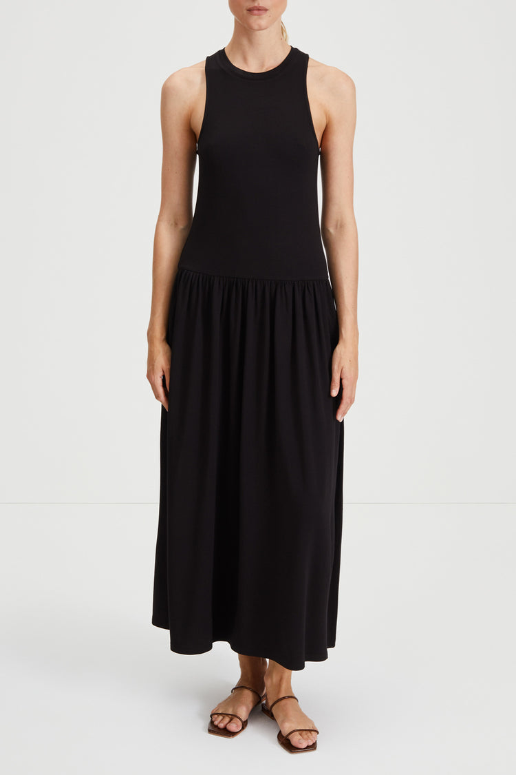 Janni dress tight fitted jersey top softly gathered skirt sleeveless black stylein front image