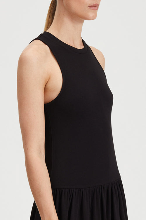 Janni dress tight fitted jersey top softly gathered skirt sleeveless black stylein detail image