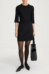 black mini skirt wool stylein tomo model image
