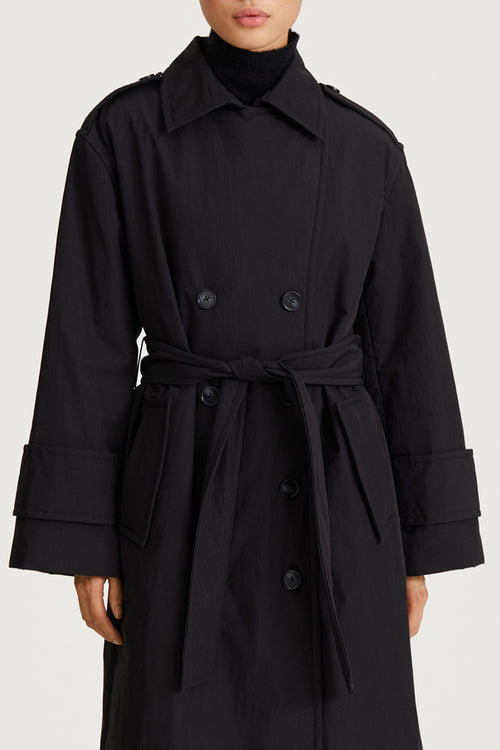 black padded trench coat stylein sandra close up