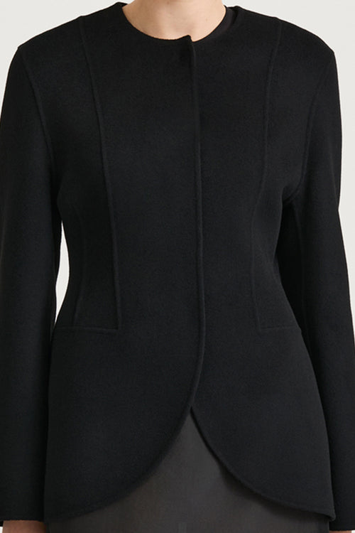 Black wool jacket cinched waist stylein tyra front close up model image