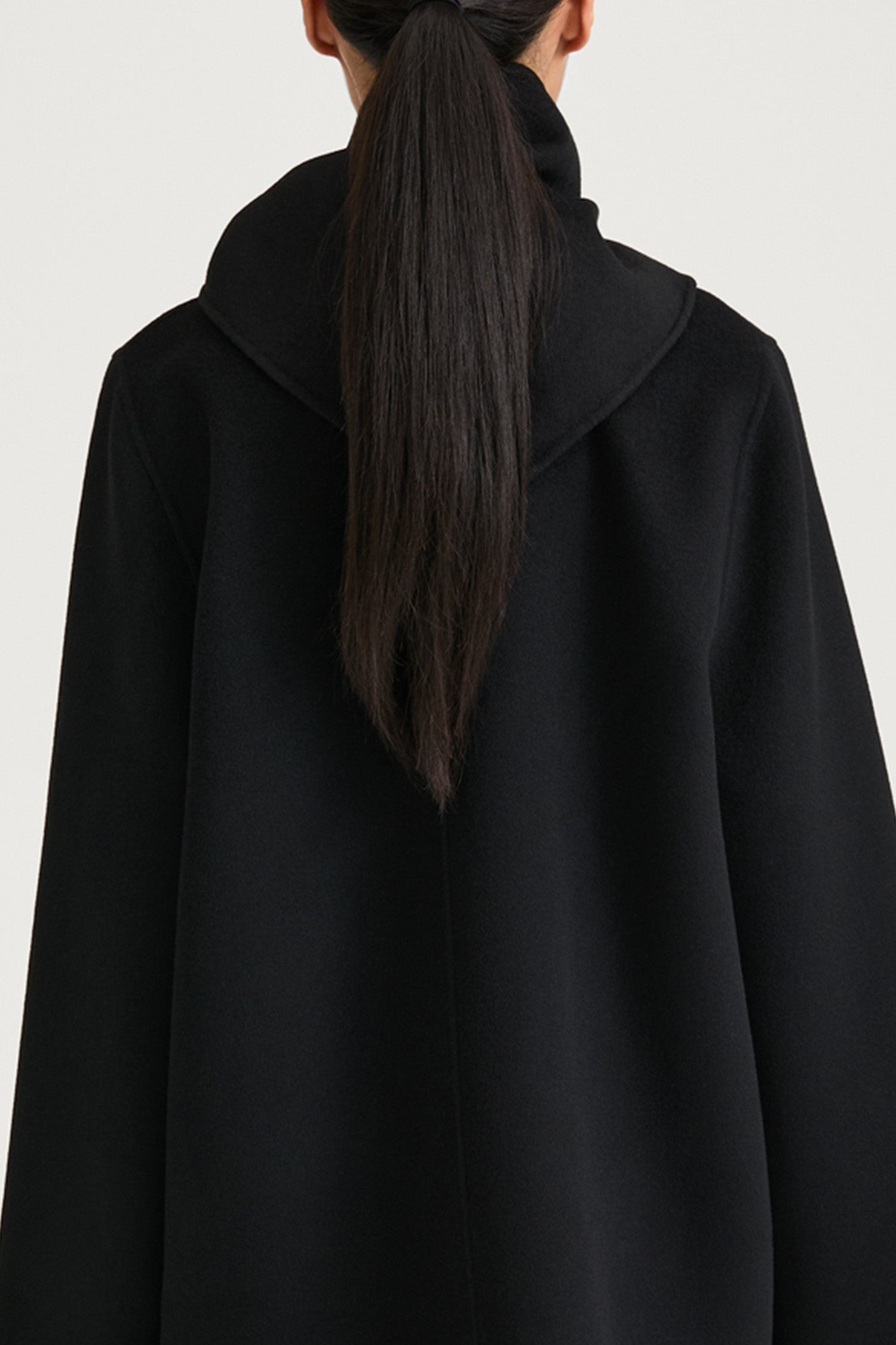 Black wool triangle scarf stylein trinity back model image