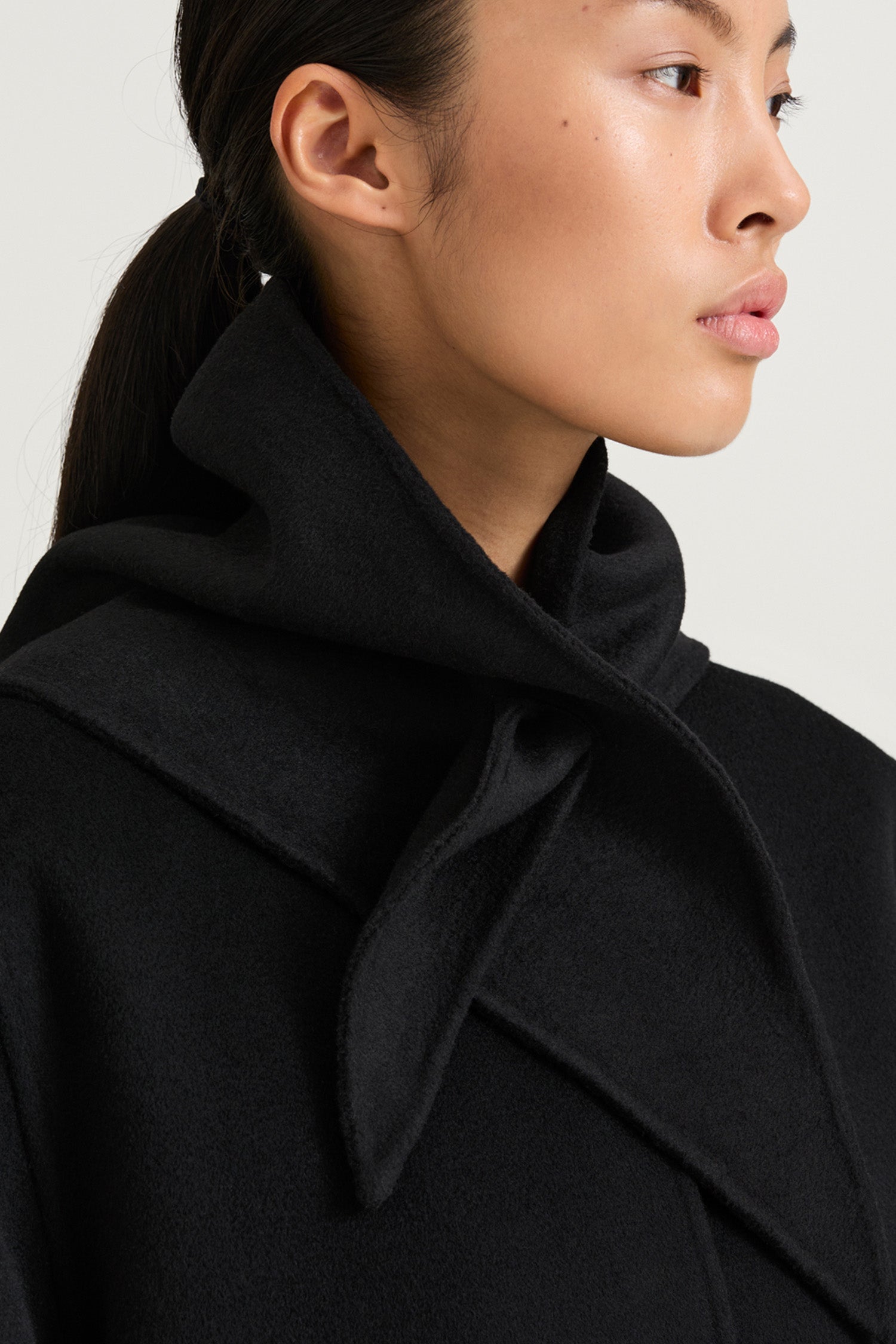 Black wool triangle scarf stylein trinity front close up model image