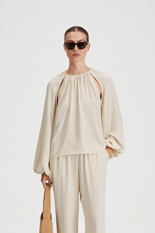 Maggiore blouse cream cut out longsleeve stylein front image