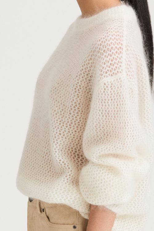 Cream knitted sweater stylein nella side close up model image