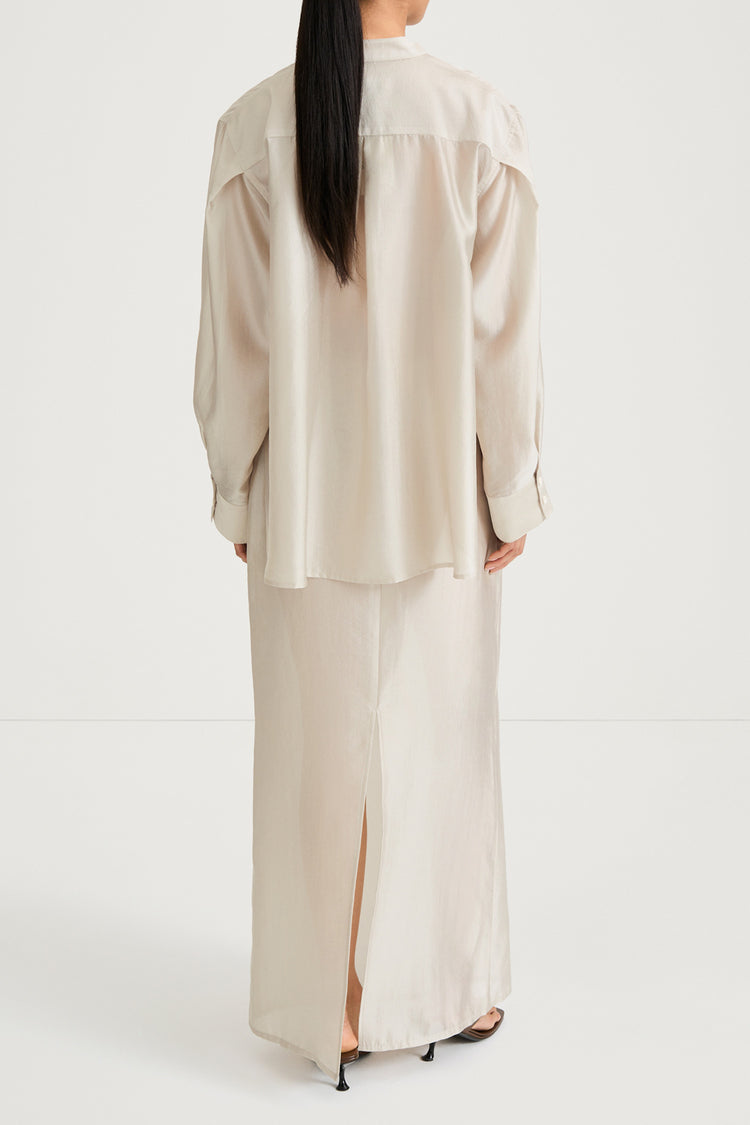 Cream maxi transparent skirt stylein back model image