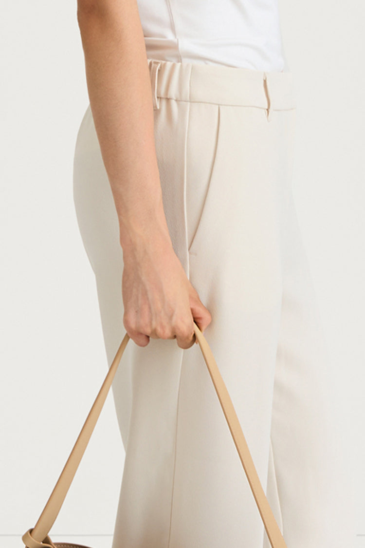 Ivory suit trousers bergio stylein side close up model image