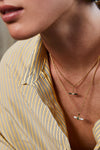 laura vann bridget white enamel t-bar necklace model image