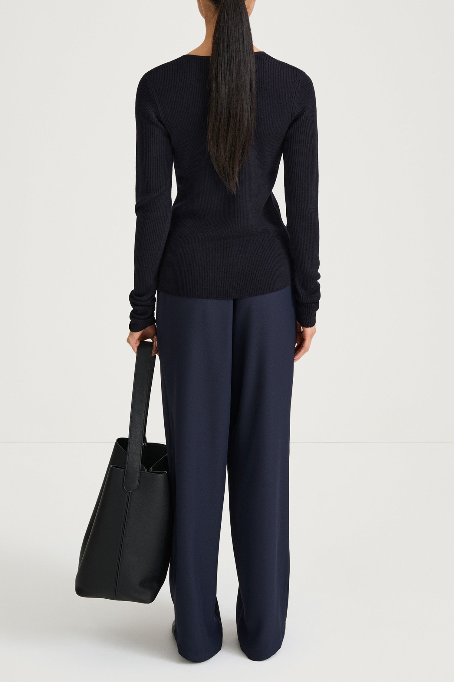 Navy buttoned cardigan stylein hamani back model image