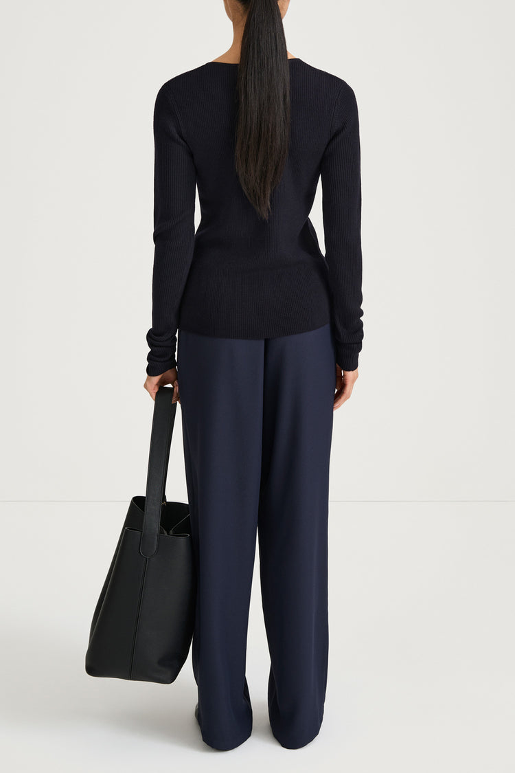 Navy buttoned cardigan stylein hamani back model image