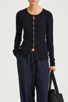 Navy buttoned cardigan stylein hamani front close up model image