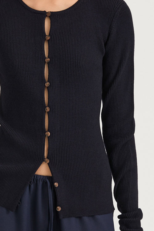 Navy buttoned cardigan stylein hamani front close up model image