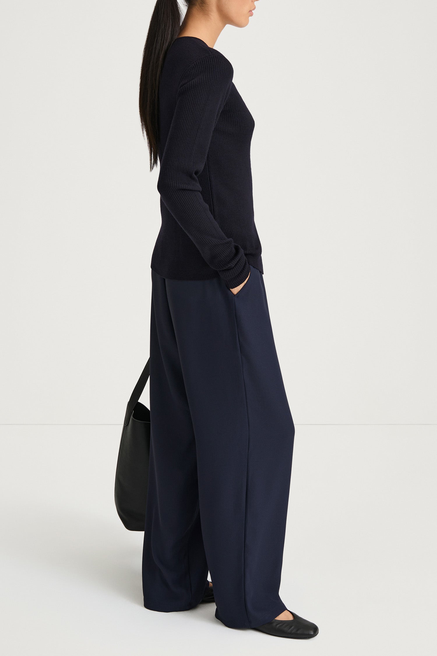 Navy buttoned cardigan stylein hamani side model image