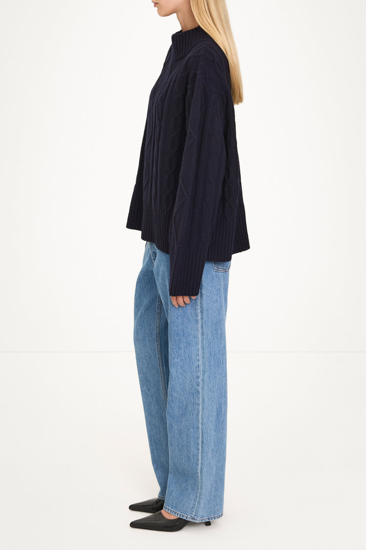 Navy cable knitted sweater stylein Hania side
