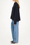 Navy cable knitted sweater stylein Hania side