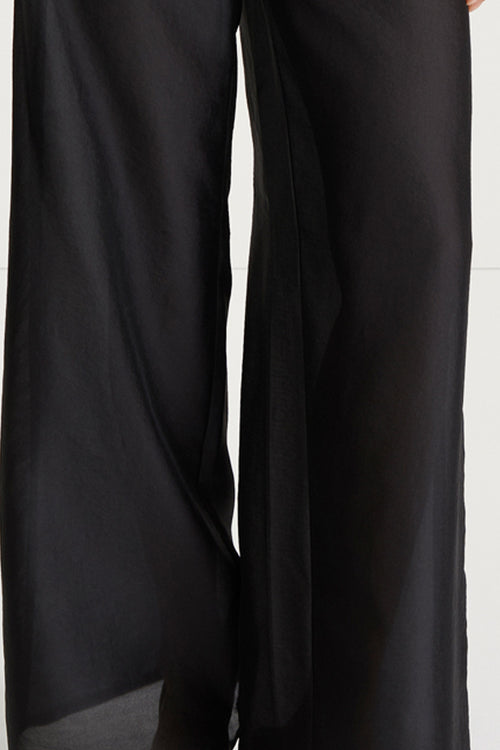 sheer black trousers bitonto stylein detail