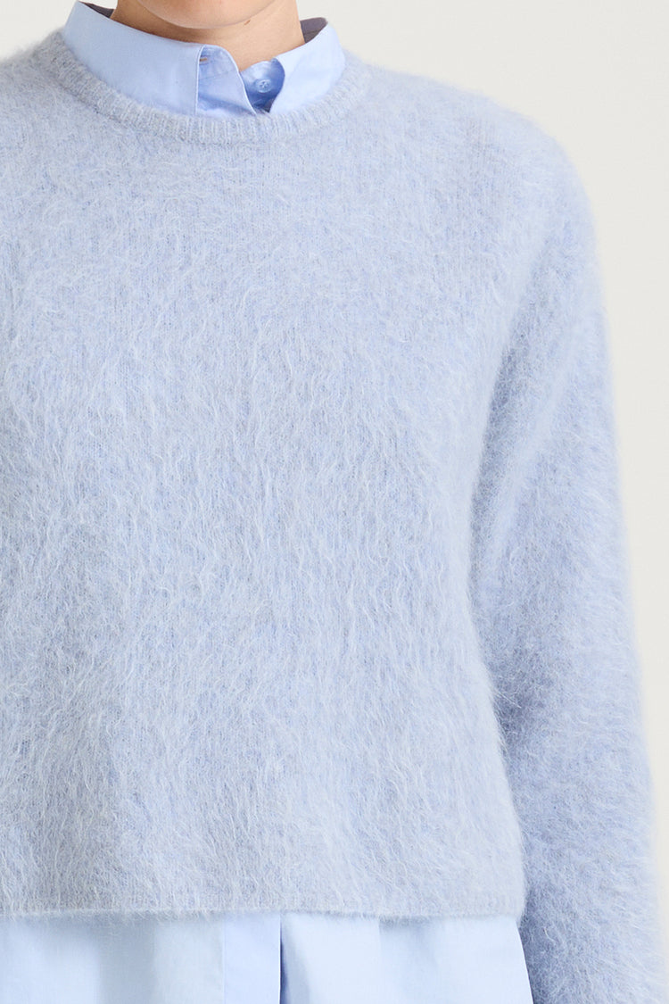 short cropped blue knitted sweater stylein detail