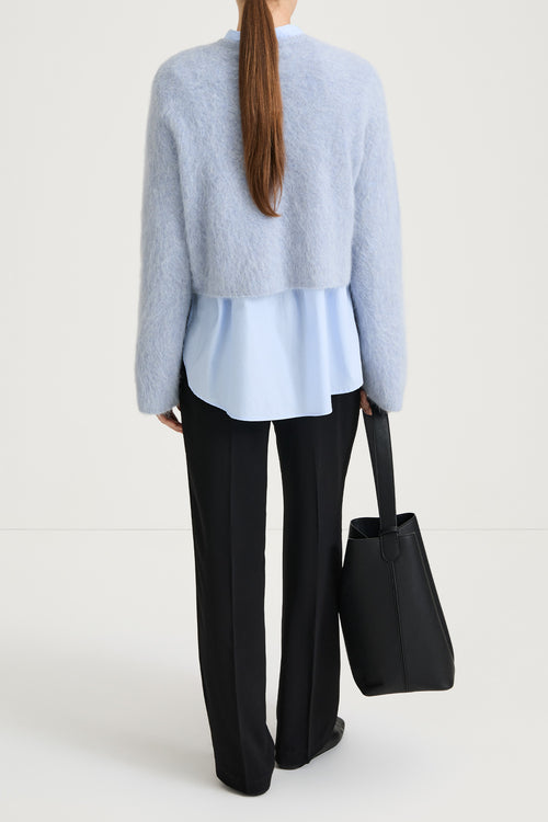 short cropped blue knitted sweater stylein back
